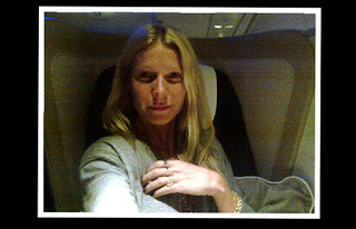 Gwyneth struggling in first class (source – goop.com) 