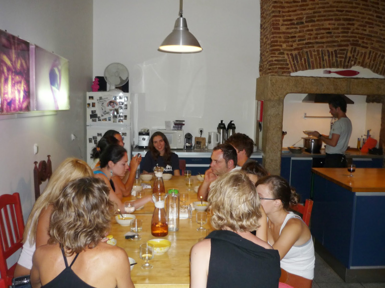 Breaking bread at the Lisbon Lounge Hostel (source – Pulped Travel)