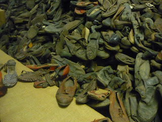 The enormous collection of shoes taken from the victims at Auschwitz. (source - Pulped Travel)